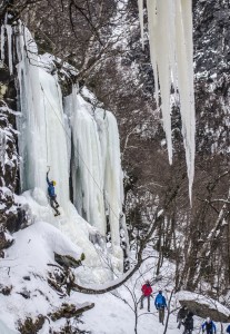 Climbers working on steep ice technique at the Work Out Wall. Photo by Dominique Powers.